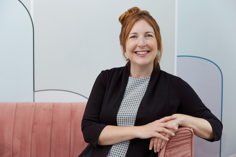 A photo of Dr. Lynsey Johnson, DNP, FNP-C, Nurse Practitioner and founder of NP Telehealth Consultants, smiling at the camera.